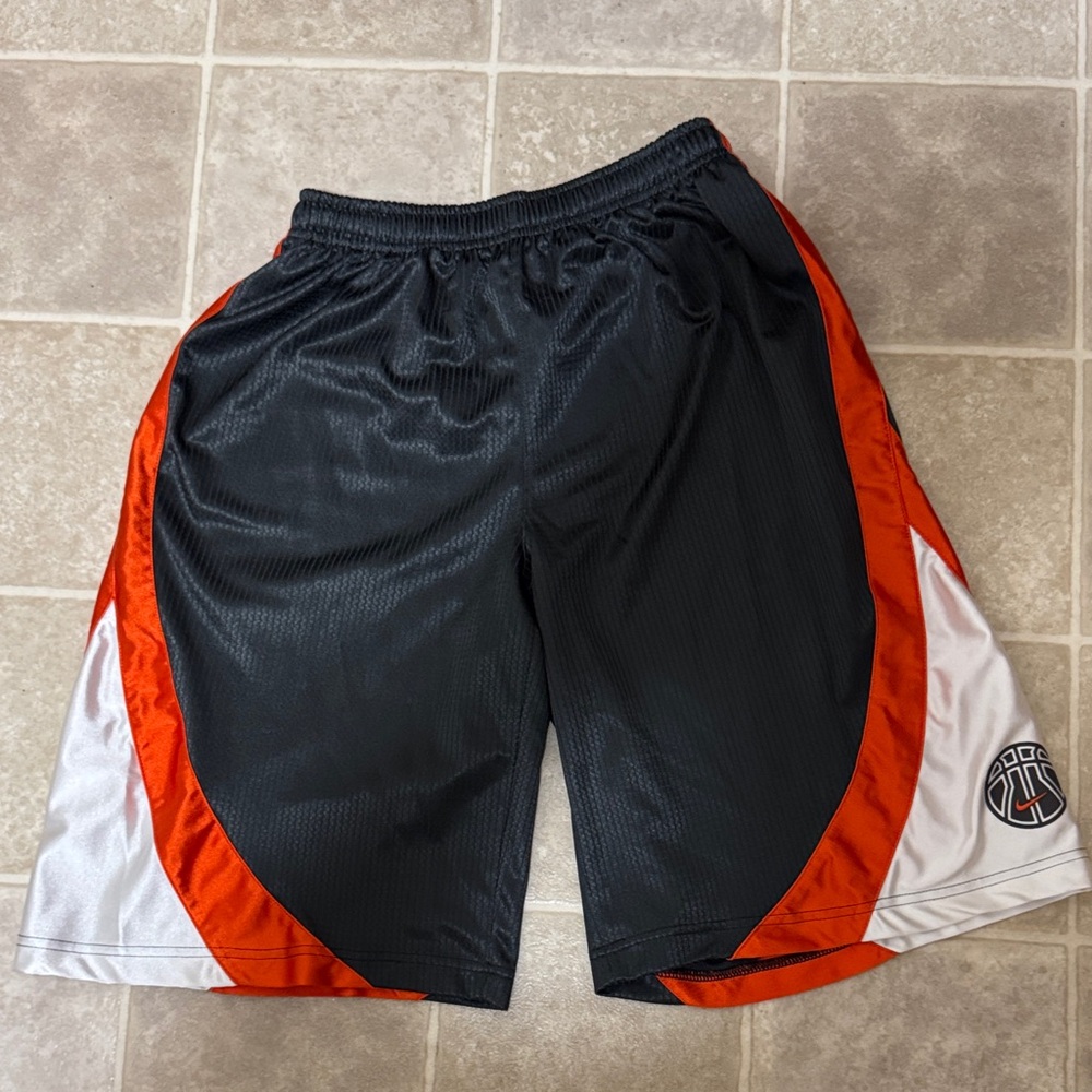 Nike Black, Orange, and White boys Athletic Shorts 18-20